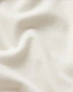 A FABRIC SWATCH OF SKIMS BOYFRIEND