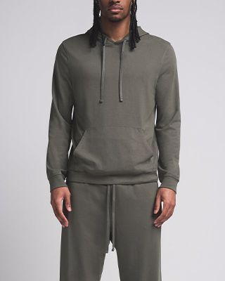 A model poses wearing SKIMS JERSEY LOUNGE